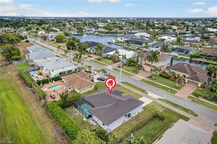 Aerial view. Located in quiet neighborhood close to beach, recreation, shopping, and schools.