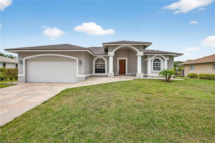 Street view. Located in quiet neighborhood close to beach, recreation, shopping, and schools.