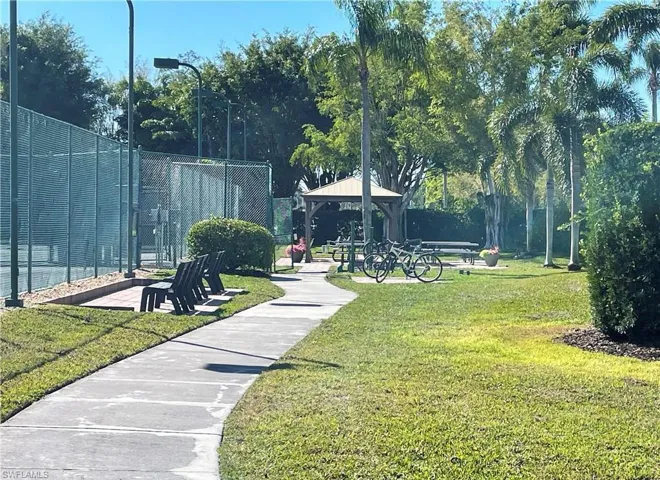 View of property's community featuring a gazebo and a patio