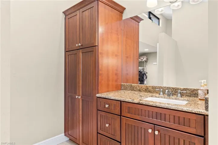 Bathroom featuring a walk in closet