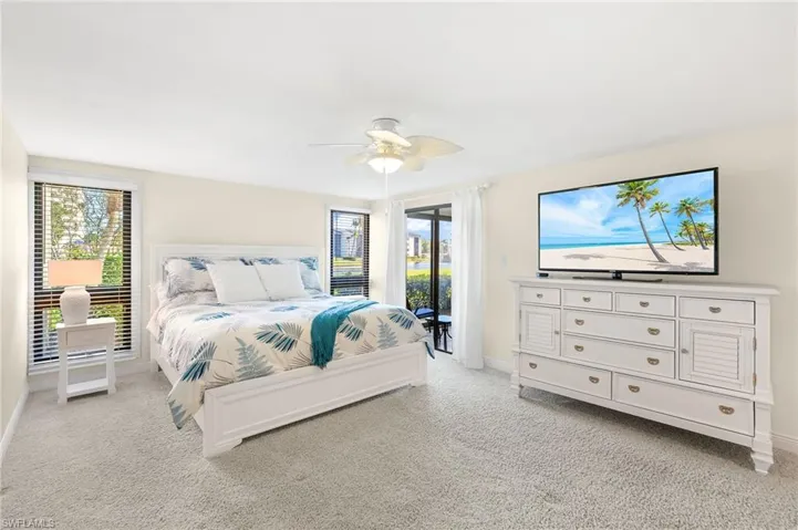 Bedroom with access to enclosed lanai
