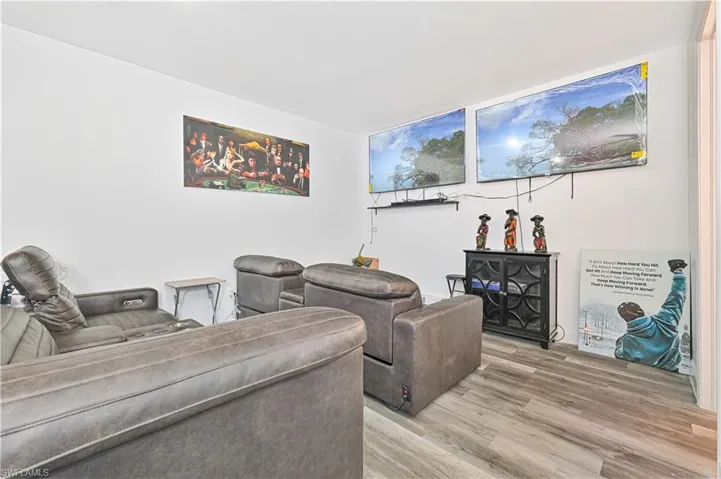 Living area featuring wood finished floors