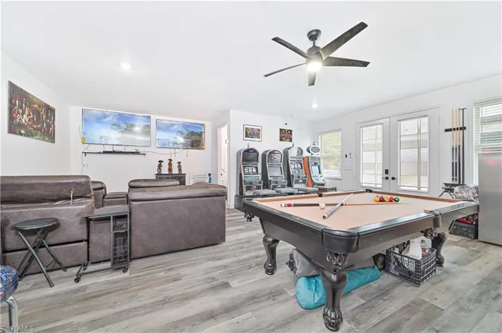 Playroom with light wood-style flooring, ceiling fan, pool table, and recessed lighting