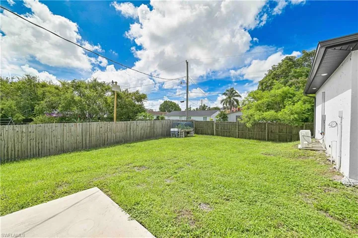 View of fenced backyard