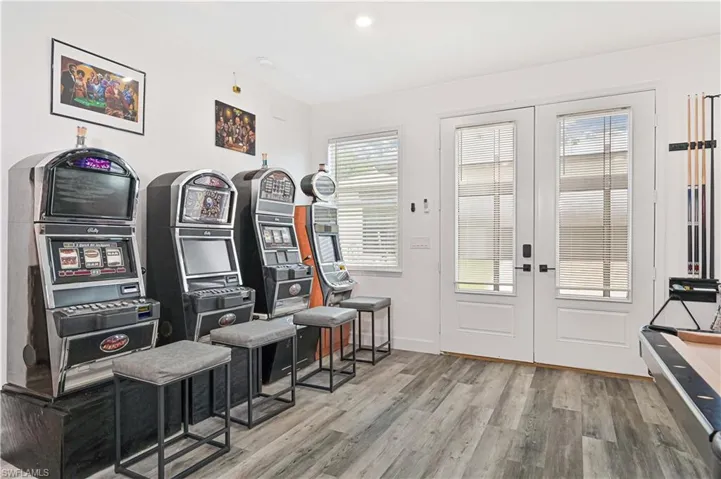 Playroom featuring french doors and wood finished floors