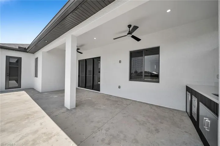 View of patio with ceiling fan
