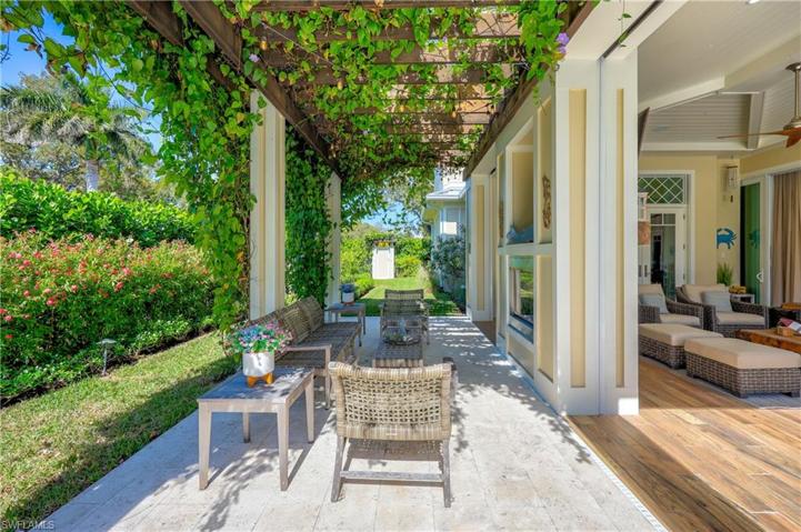 Outdoor pergola with fireplace