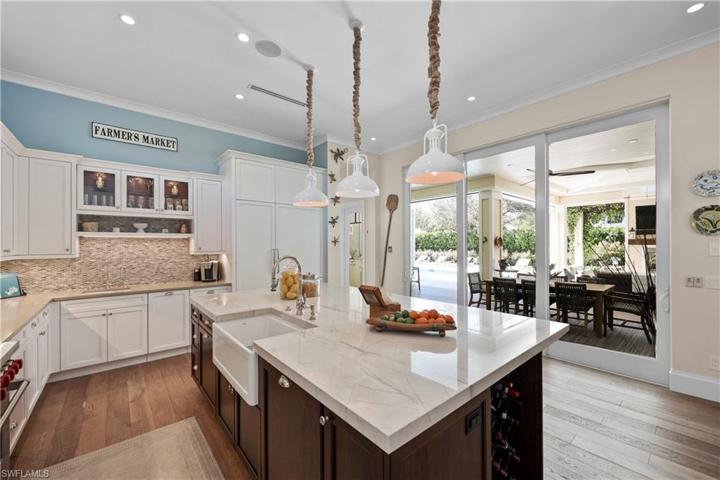 Kitchen opens to outdoor lanai