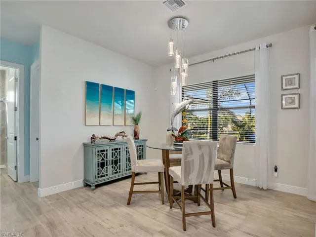 Dining area featuring light hardwood / wood-style flooring