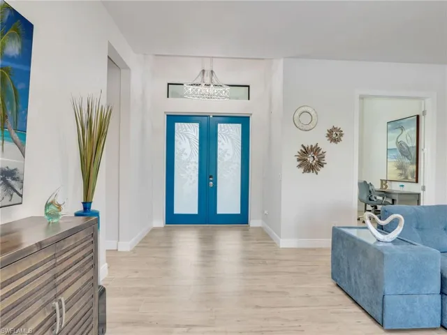 Entryway featuring french doors and light hardwood / wood-style floors