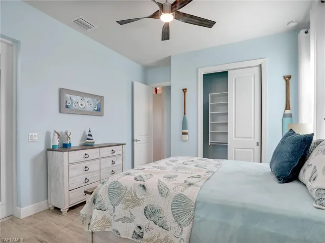 Bedroom featuring a closet and ceiling fan