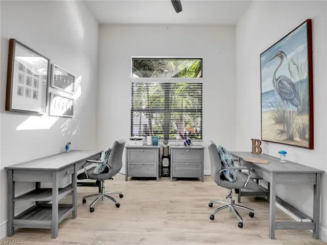 Office space featuring light hardwood / wood-style floors