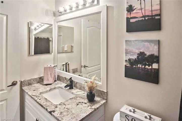 Bathroom with vanity and toilet