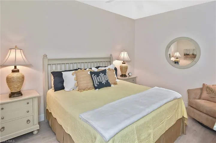 Bedroom with light wood-type flooring and ceiling fan