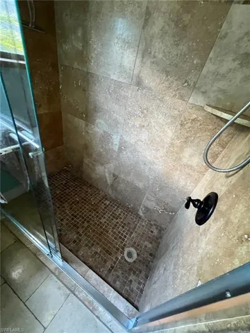 Bathroom featuring an enclosed shower