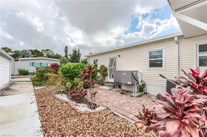 Rear view of property with a patio