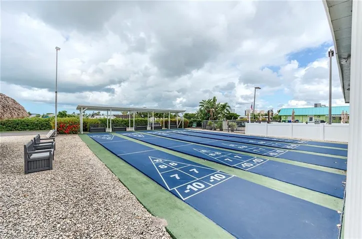 View of community featuring shuffleboard