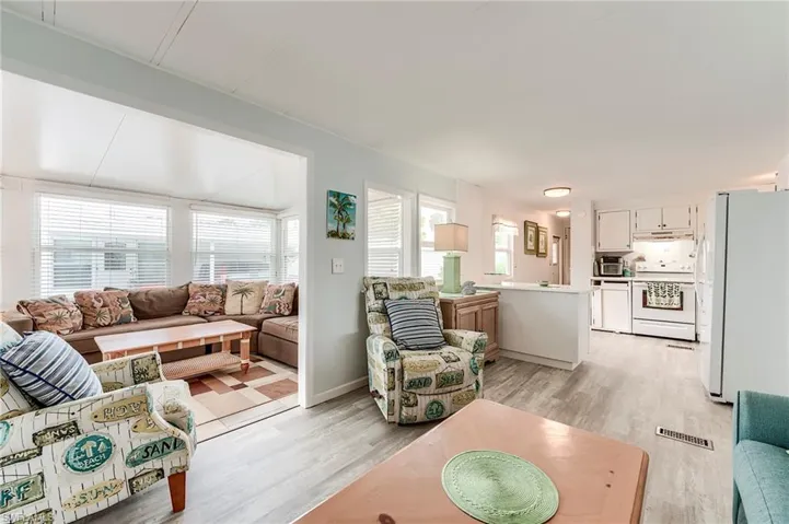 Living room with light wood-style floors