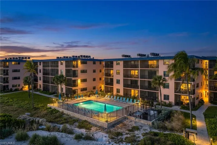 Community pool featuring a patio
