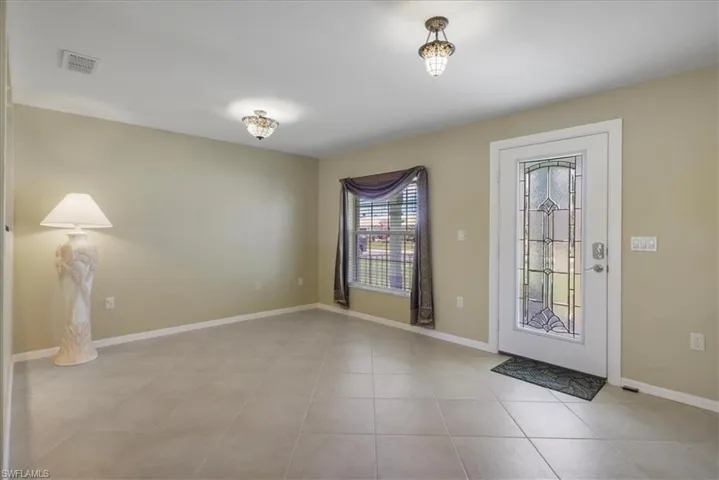 8141 Liriope Loop, Lehigh Acres, Florida 33972