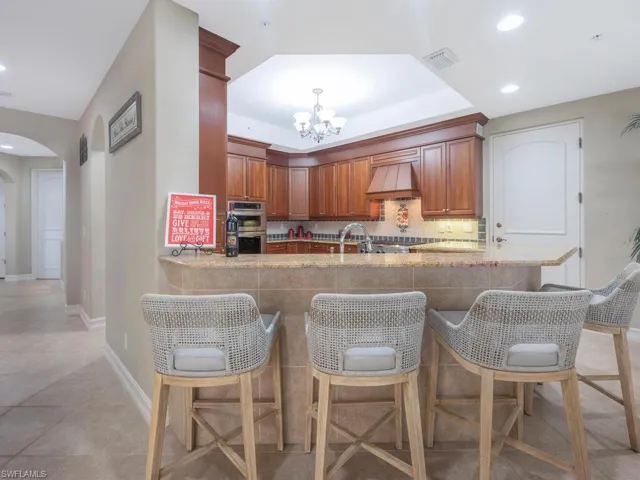 Kitchen featuring  kitchen bar