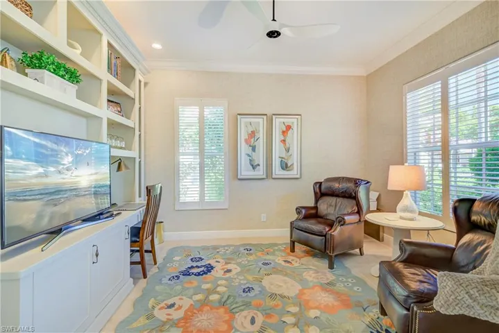 Den/Office with custom built-in cabinets.