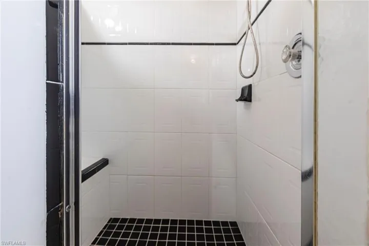 Bathroom featuring a tile shower