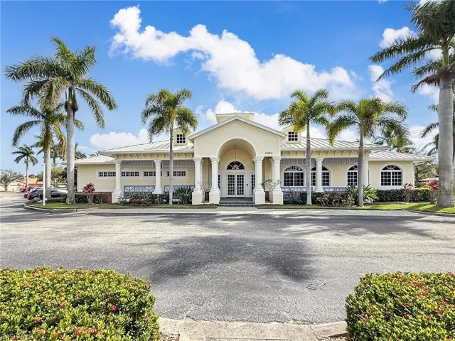 View of building exterior with a garage