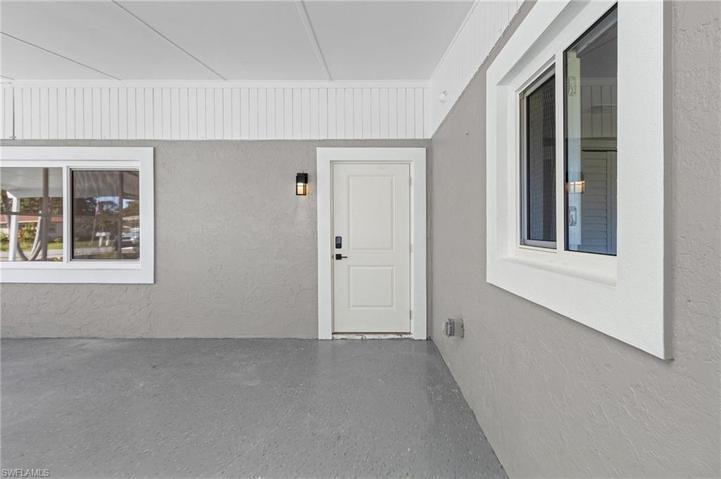 Screened-in entry.