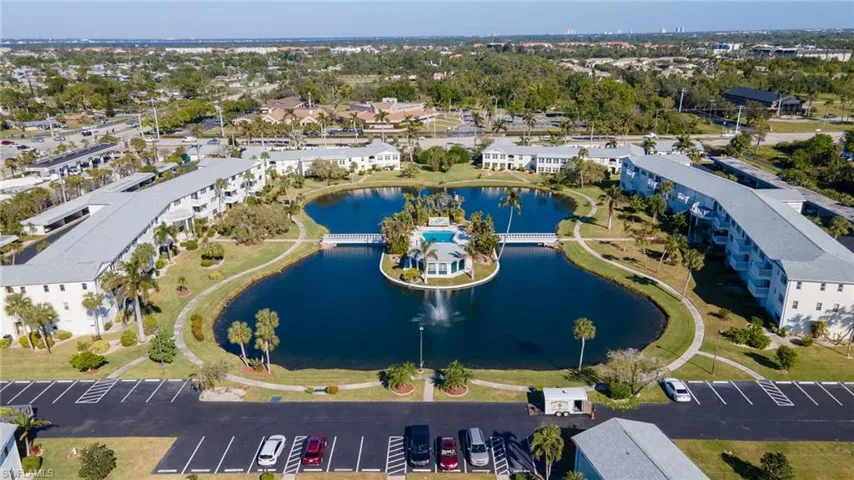 Aerial overview of property's location with a large body of water