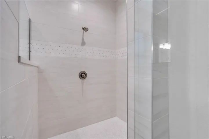 Bathroom with a tile shower