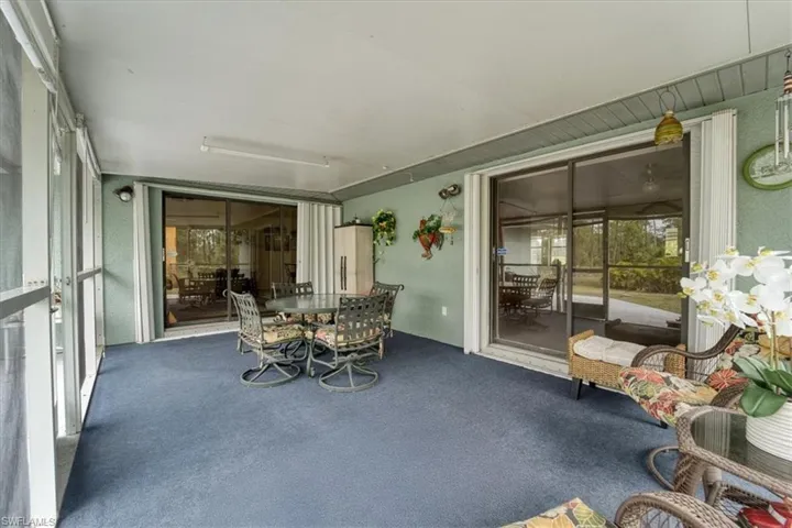 View of sunroom / solarium / screened