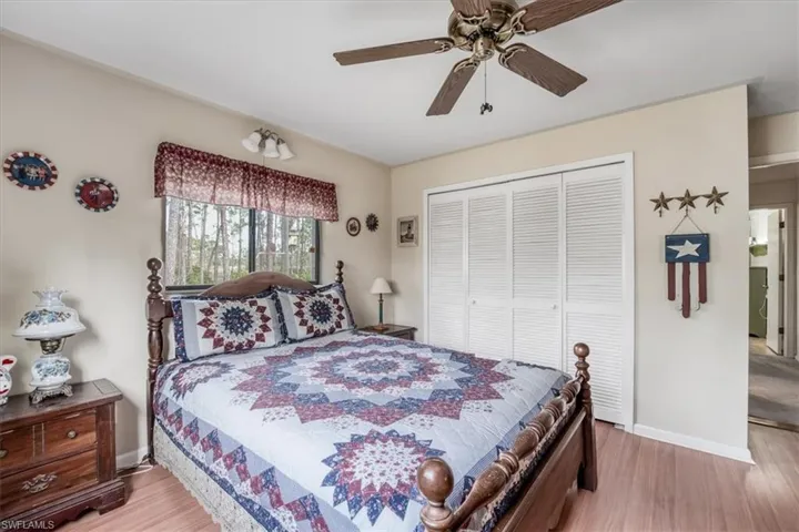 with wood-style floors, and ceiling fan