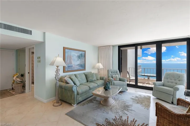 Tile flooring in living areas, carpet in the bedrooms