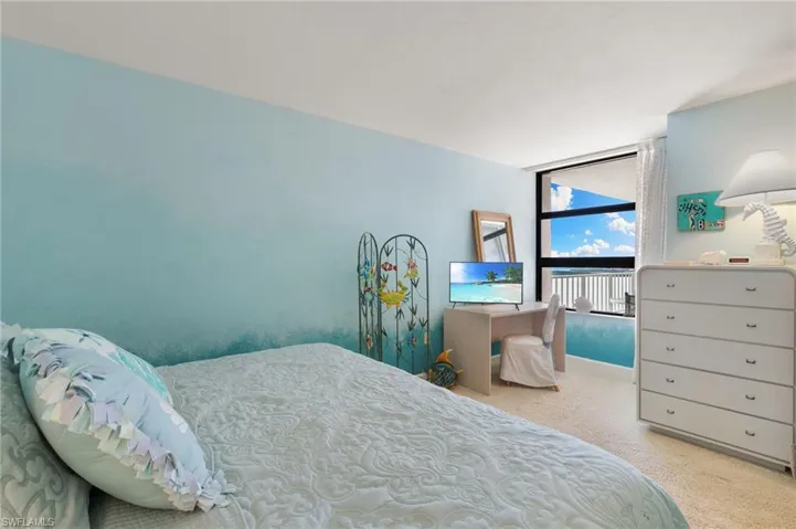 Guest bedroom window with view of the beach