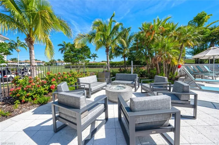 View of terrace featuring an outdoor living space with a fire pit