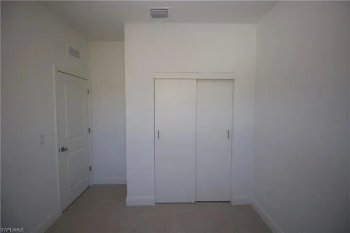 View of tiled bedroom