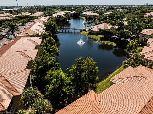 Aerial view of residential area with a nearby body of water