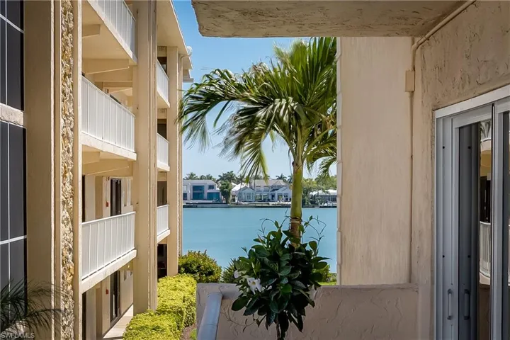 Stepping outside the Dining Room slider looking at the Bay.
