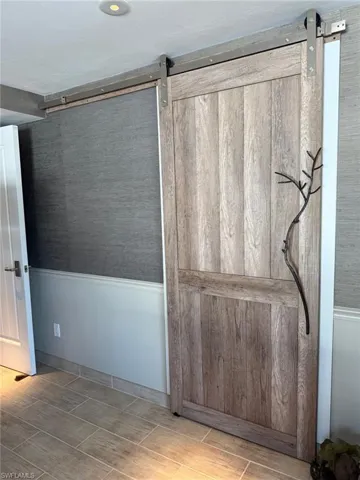 Custom Barn style door to the Primary Bath.
