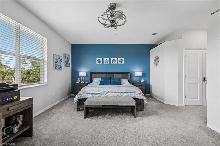 Bedroom featuring carpet floors