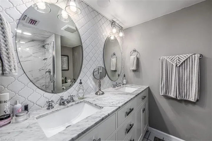 Bathroom with vanity and walk in shower