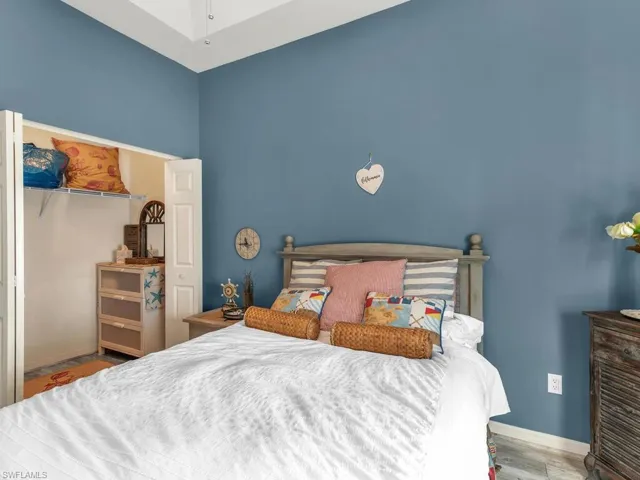 Bedroom featuring light hardwood / wood-style floors and a closet