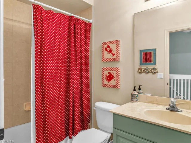 Bathroom with vanity and toilet