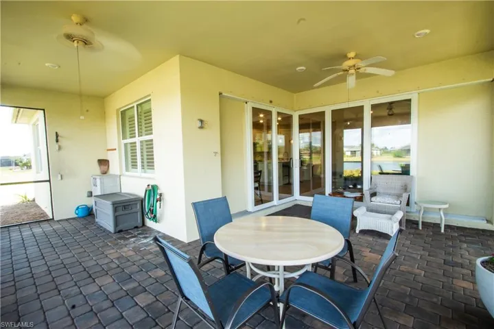 Large L-shaped lanai is 26' wide and 21' deep