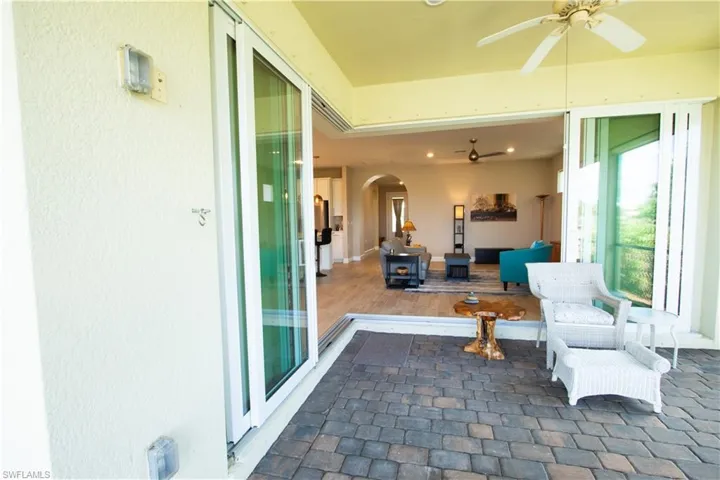 Large L-shaped lanai is 26' wide and 21' deep