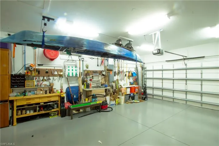 Extended 24'x18'7" garage with epoxy floor and a/c