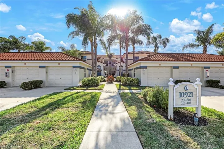 The community is thoughtfully landscaped with lush, well-maintained grounds.
