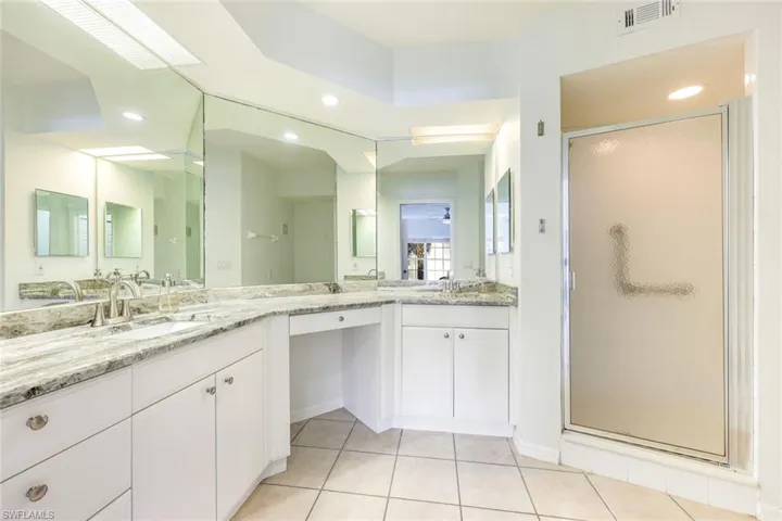 The primary ensuite is spectacular with a so much storage and newer granite countertops.