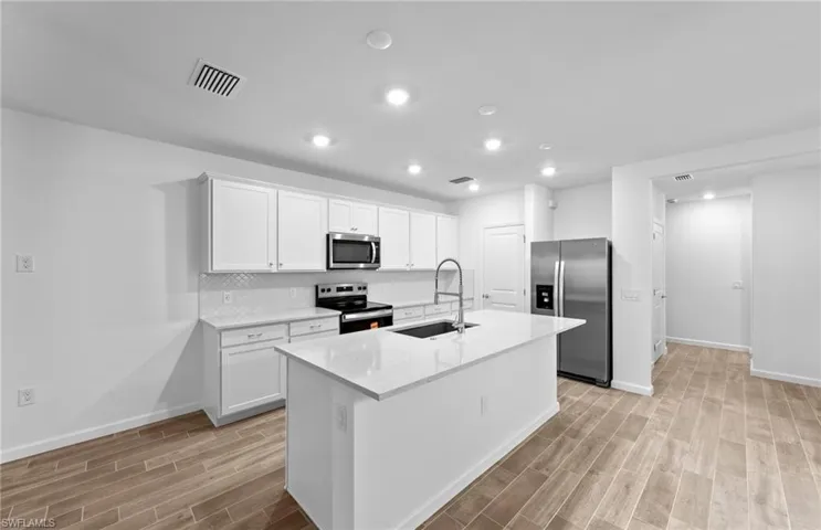 Photo depicts the actual home available for sale.